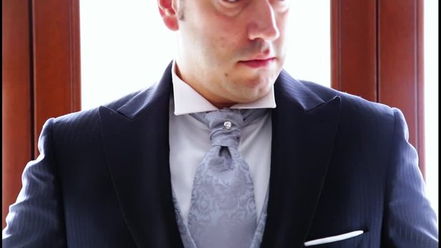 elegant groom tait