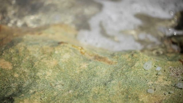 Surf on a beach closeup