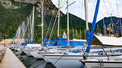 lago di Garda. Boats in the harbor. Sailing boats yachts on Garda lake