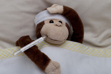 a toy monkey is sick