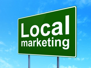 Advertising concept: Local Marketing on road sign background