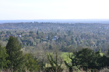 Fototapeta na wymiar Views from Reigate hill on an early spring afternoon looking down at Reigate