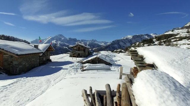 Gruppo di baite in inverno, Valmalenco, Italy