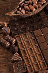 Chocolate sweet, cocoa pod and food dessert background