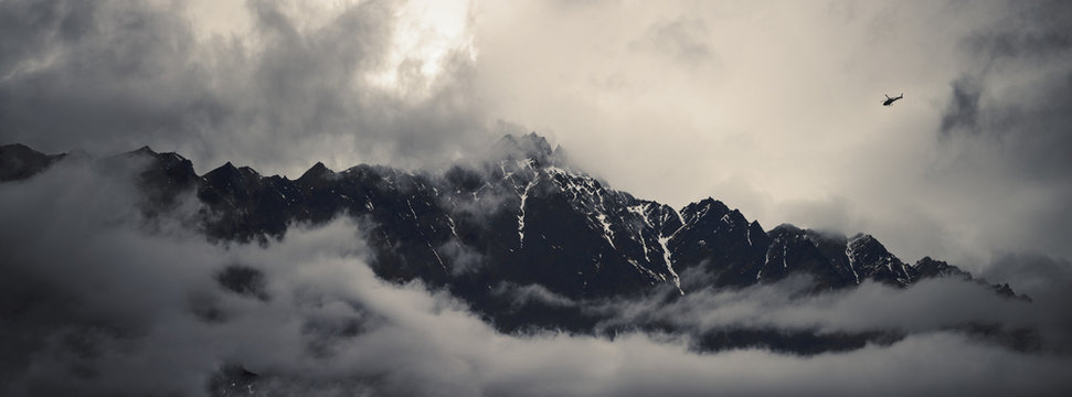 View of mountains in clouds