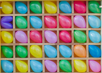 Multi-colored balloons in the cells