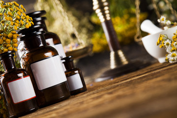 Medicine bottles and herbs background