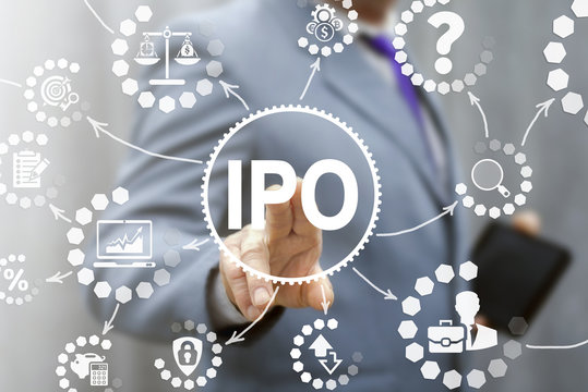 IPO (Initial Public Offering) finance business concept. Businessman touched ipo icon on virtual trading screen. Financial trade exchange investment and strategy technology.