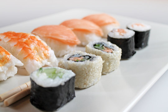 Set of sushi roll close up. Different types of susheson plate.