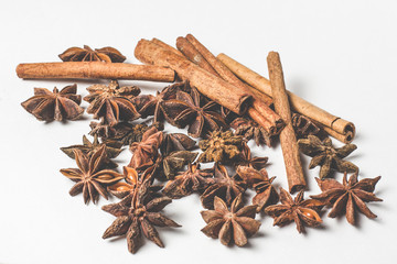 cinnamon stick and star anise spice isolated on white background closeup