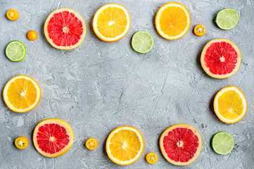 design with blood orange and lime on gray background top view mock-up
