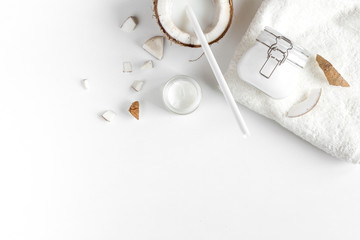 organic cosmetics with coconut on white background top view mockup