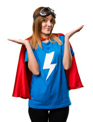 Pretty superhero girl making unimportant gesture