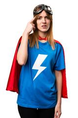 Pretty superhero girl making crazy gesture
