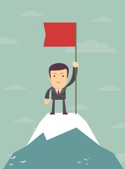 young man standing on top of mountain with flag