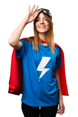 Pretty superhero girl saluting