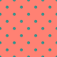 seamless green dot glitter pattern on orange background