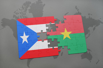 puzzle with the national flag of puerto rico and burkina faso on a world map
