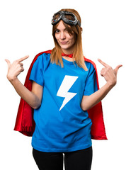 Pretty superhero girl proud of herself
