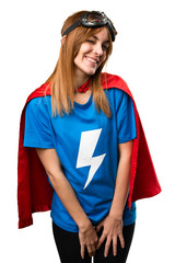 Pretty superhero girl winking