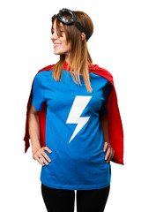 Pretty superhero girl looking lateral