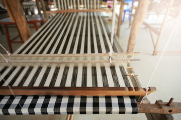 Traditional Thailand weaving loom made from timber and bamboo for making clothes,color toned.