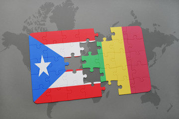 puzzle with the national flag of puerto rico and mali on a world map