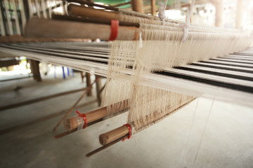 Traditional Thailand weaving loom made from timber and bamboo for making clothes,color toned.