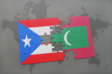 puzzle with the national flag of puerto rico and maldives on a world map