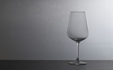 Wine glass on black and white background. 