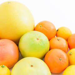 Citrus fruits - lemon, orange, grapefruit, sweetie and pomelo isolated on white background. Fruit's background