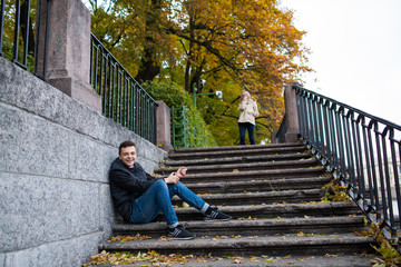 Cute young guy wants to meet, passing by the girl