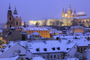 Winter in Prague - city panorama with St. Vitus Cathedral and St. Nicholas Church