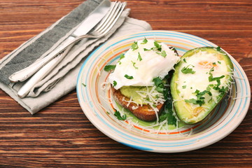 Sandwich with avocado and a fried egg