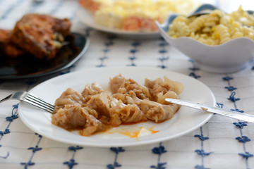 Serbian specialty sarma in the white plate chopped