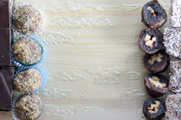 Colorful and delicious home made small cakes arranged on glass plate