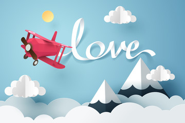 Paper art of love calligraphy and lettering hang with a pink plane flying in the sky, origami and valentines day concept