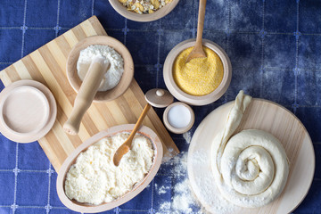 Various ingredients in woodwork dishes. Cereals, wheat, salt,...