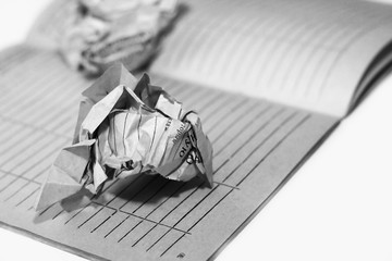 Old crumpled paper on notebook