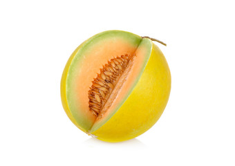 cut fresh yellow melon with stem on white background