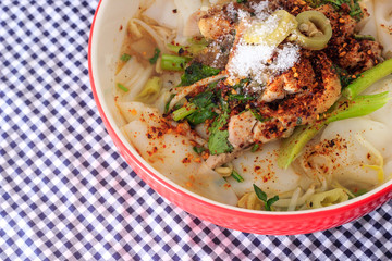 Fototapeta na wymiar chicken noodles in soup thai style
