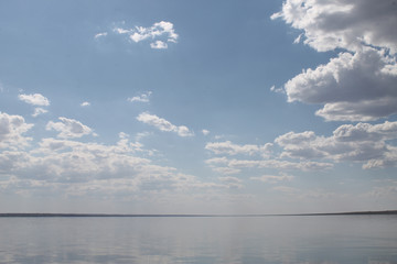 the sky reflected in the water, deserted beach lake, summer sky, nature, blue cloud,