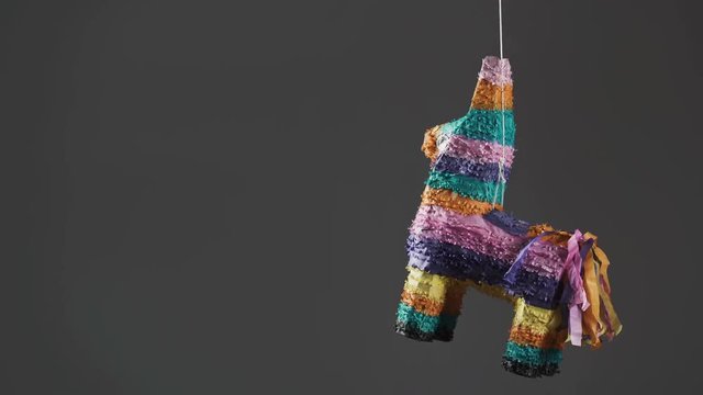 Party Pinata on grey background with copy space