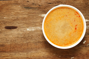 Thai spicy fish sauce put in the white bowl represent the thai cuisine and food concept related idea.