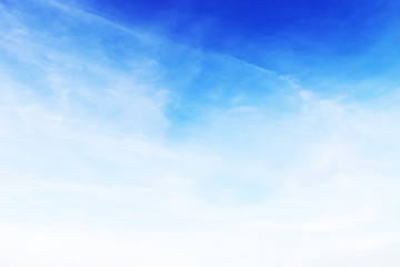 Soft white clouds against blue sky background and empty space for your design