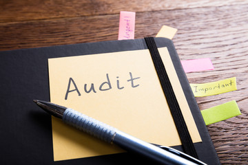 An Audit Diary With Sticky Note