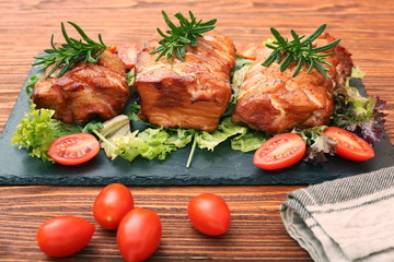 Homemade smoked ham on a board