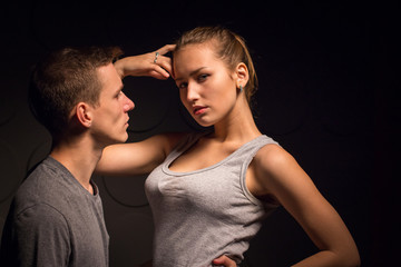 Passionate young couple in the room