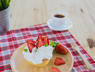 Homemade cake, fresh,  and delicious dessert with juicy strawberries, sweet whipped cream