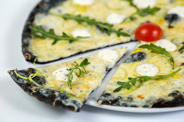 Black cheese pizza on white background